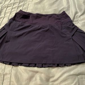 Navy blue Tennis Skirt brand New still in bag so it’s wrinkled supper cute